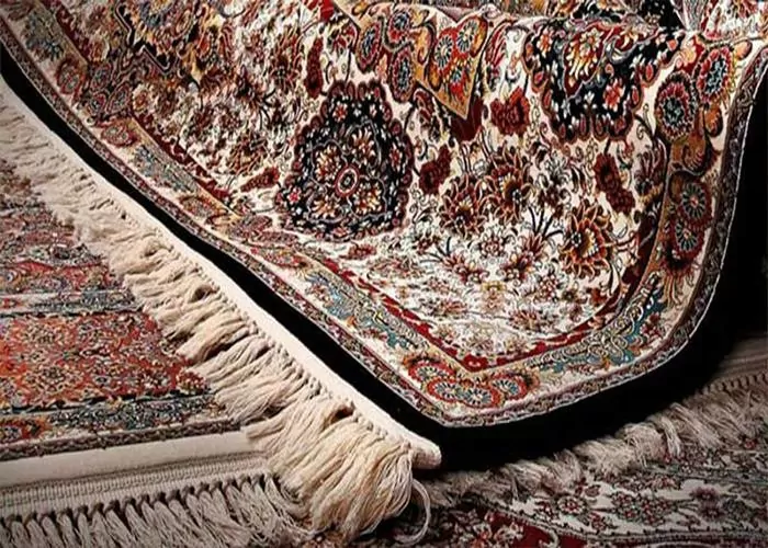 تراکم به فاصله نخ‌های گره خورده گفته می‌شود.